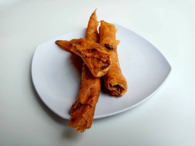 Kızarmış muz çikolatalı karamel, Endonezya 'da popüler ve ucuz atıştırmalıklar. Tatlı ve çıtır çıtır