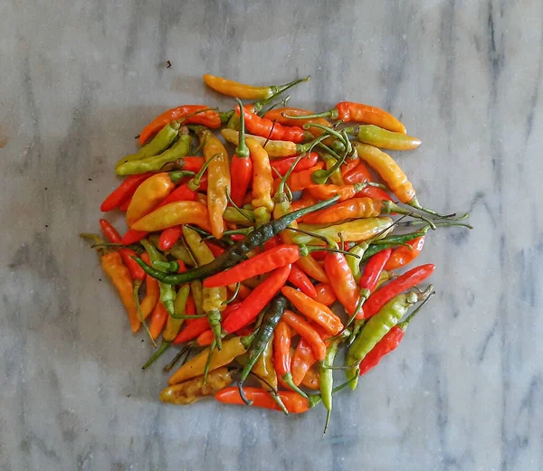 Bird's eye, bird eye chili, bird's chili or Thai chili, or chili pepper. Close up detail. Various color.