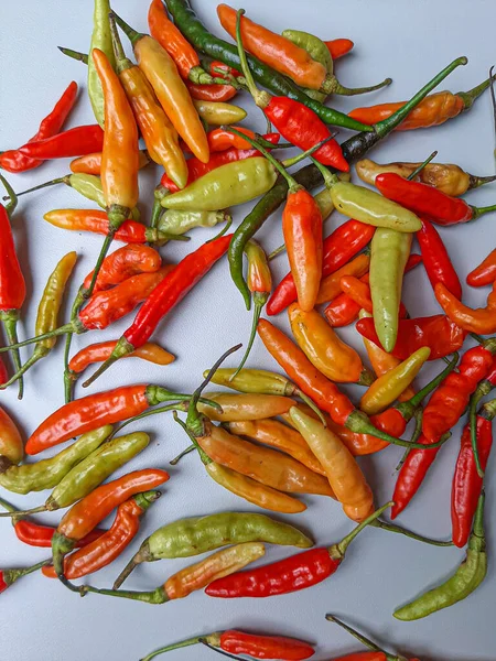 Bird's eye, bird eye chili, bird's chili or Thai chili, or chili pepper. Close up detail. Various color.