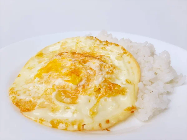 Fried Egg Overcooked Sunny Side Served White Rice White Plate — Stock Photo, Image