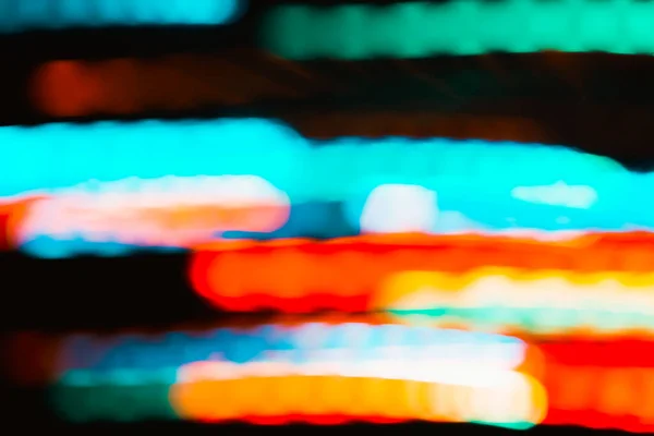 Abstract Colored Defocus Background Neon Glowing Lights Horizontal Motion Blur — Stock Photo, Image