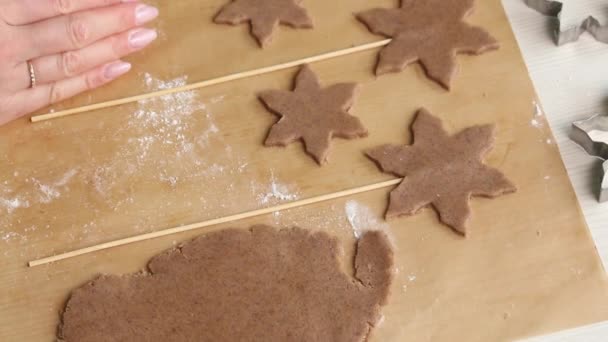 Woman Rolls Out Gingerbread Dough Gingerbread Stick Gingerbread Form Snowflakes — Stockvideo