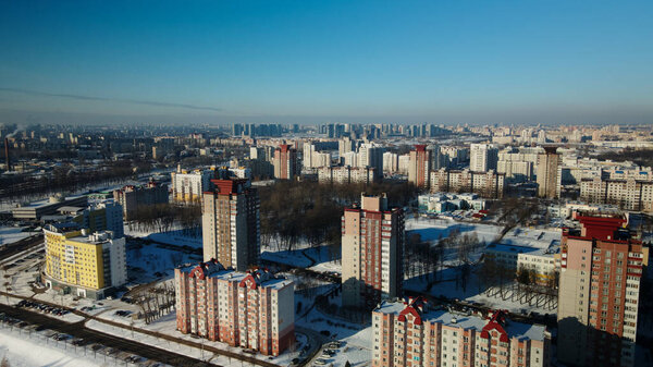 City block. Modern multi-storey buildings. Winter cityscape. Aerial photography.
