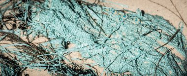 BANNER soyut güzellik arka planı. Yumuşak torba kumaş, kumaş kaplama yüzey malzemesini kum zeminine kopyala. Turkuaz açık mavi renk. Tasarım çizgileri hayat fotoğrafçılığını labirente çeviriyor. Stokta daha fazlası