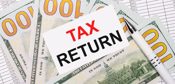 Pozadí Zpráv Dolarů Bílé Pero Karta Textem Tax Return Obchodní — Stock fotografie