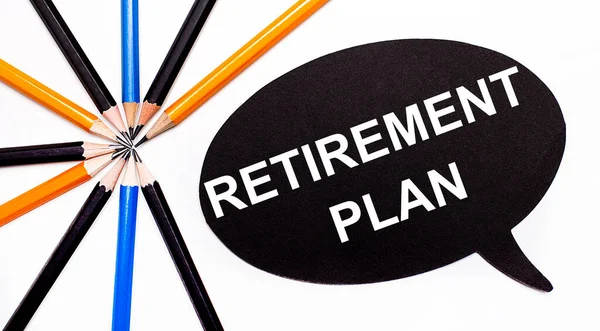 Wooden Card Text Retirement Plan Black Background Multicolored Pencils — Stock Photo, Image