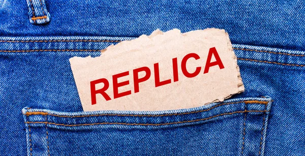 Bolso Trás Jeans Pedaço Papel Marrom Com Texto Replica — Fotografia de Stock