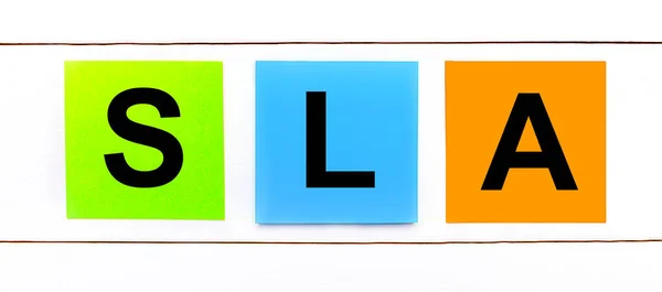 Een Witte Houten Achtergrond Zijn Drie Kleurrijke Heldere Stickers Met — Stockfoto