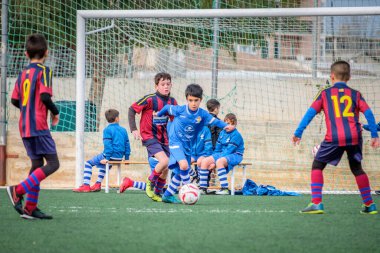 Futbol, partido de pre-benjamin C.E Espanya-Poblense, Llucmajor, Mallorca, İspanya