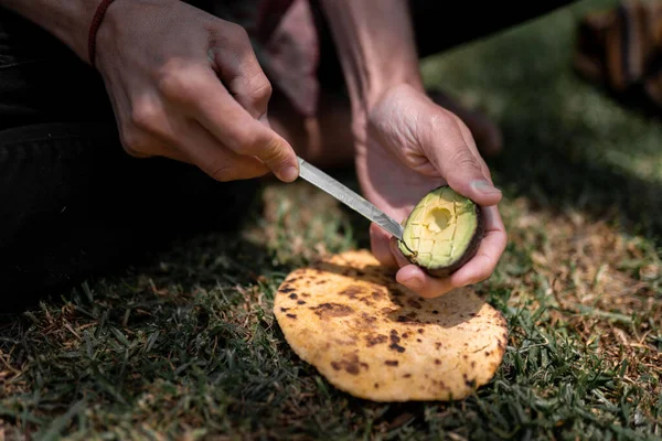 Close Young Man Cutting Avocado Tortilla Hike Concept Adventure Vacations —  Fotos de Stock