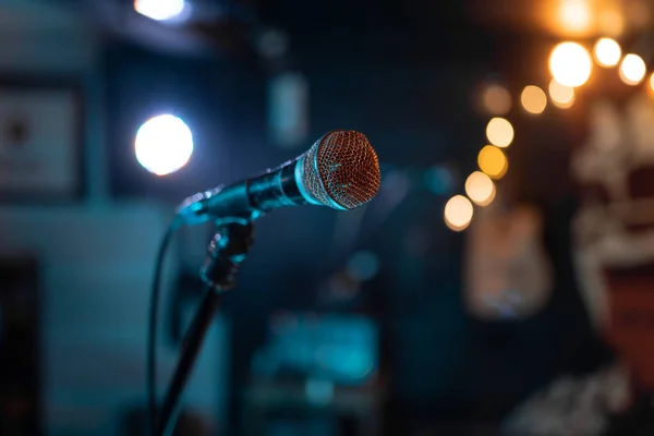 Close up of a microphone standing before a music show. Concept of live show