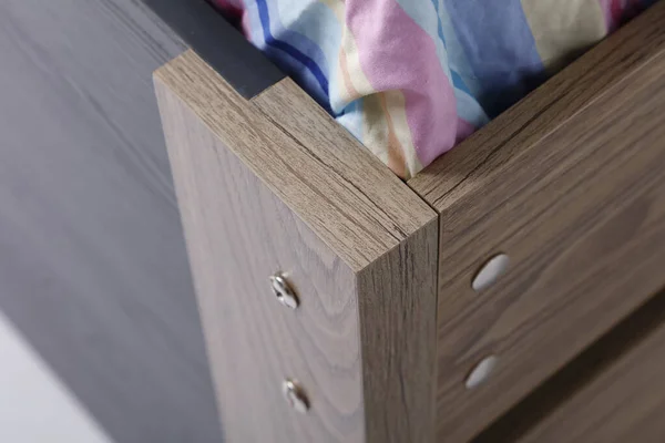 Details of the bed baby. Laminate wood .