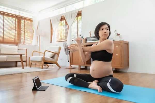 Asian Pregnant Woman Stretching Her Arms Yoga Exercise Home Expectant — Stockfoto