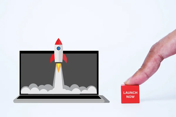 Picture Rocket Launch Laptop Finger Press Launch Now Wooden Block — Stock Photo, Image