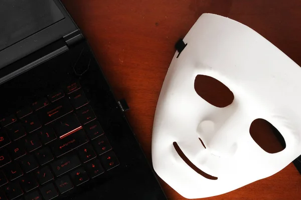 Anonymous Mask Laptop Keyboard Insight Cybersecurity Threat Concept —  Fotos de Stock