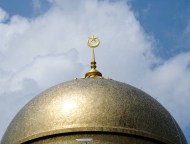 Close up picture of new golden dome mosque during  in Mersing, Johor with beautiful cloud insight.