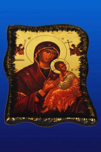 木雕上的图标 圣母玛利亚和小耶稣 背景风格各异 色彩各异 — 图库照片