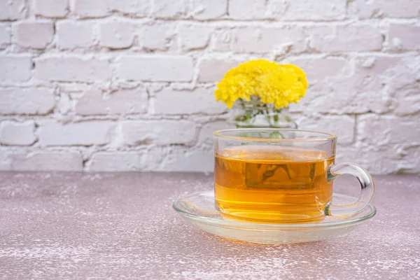 Cup Tea Yellow Flower Vase Placed Gray Stone Background White — Photo