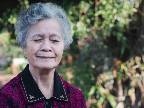 Senior Woman Short White Hair Smiling Looking While Standing Garden —  Fotos de Stock