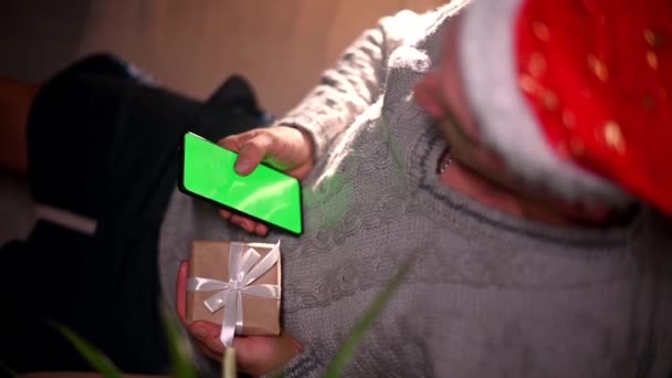 Close Man Orders Gift Online Store Using Smartphone His Family — Stock Video