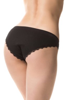 Beyaz arka planda zayıf bir kadın cesedi, külot, yarım boy çekim.