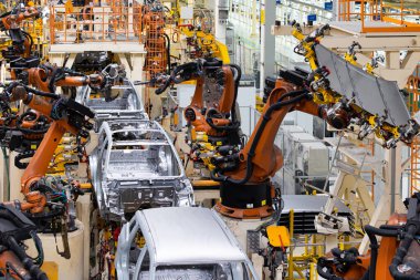 Araba cesetleri montaj hattında. Araba üretim fabrikası. Modern otomotiv endüstrisi. Üst görünüm