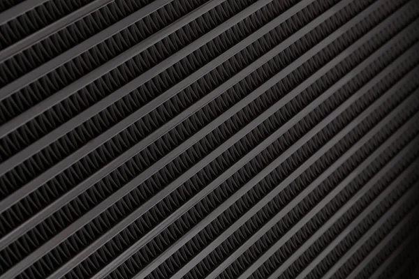 Linhas metálicas abstratas e texturizadas no radiador do carro macro close up view — Fotografia de Stock