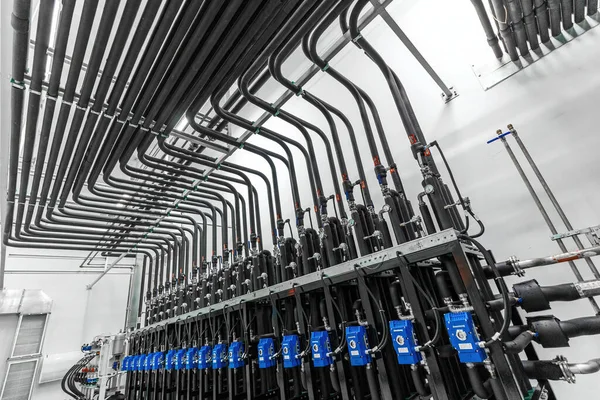 Photo of stainless steel pipes in the factory. Chemistry and medicine production. Pharmaceutical high-tech plant interior — Stock Photo, Image