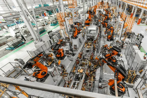 Photo of automobile production line. Welding car body. Modern car assembly plant. Top view — Stock Photo, Image