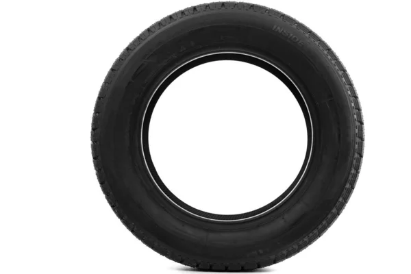 Round car tire on white wall background — Stock Photo, Image