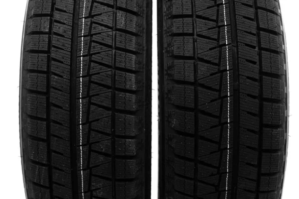 Winter tire tread close up on white background — Stock Photo, Image