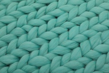 Örgü örülmüş nane rengi büyük doğal yün örgü konsepti