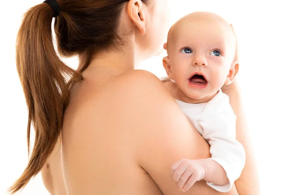 Crying baby on mothers breast on a white background, Concept of tenderness and breastfeeding — Stock Photo, Image