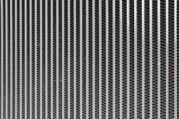 Car radiator background. Engine cooler background. Vintage style.Grid radiator air conditioning, close-up abstract photo shot — 图库照片