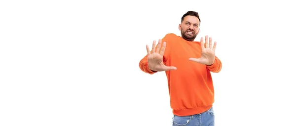 Indignant displeased man waves his hands with a wrinkled angry face — Foto Stock