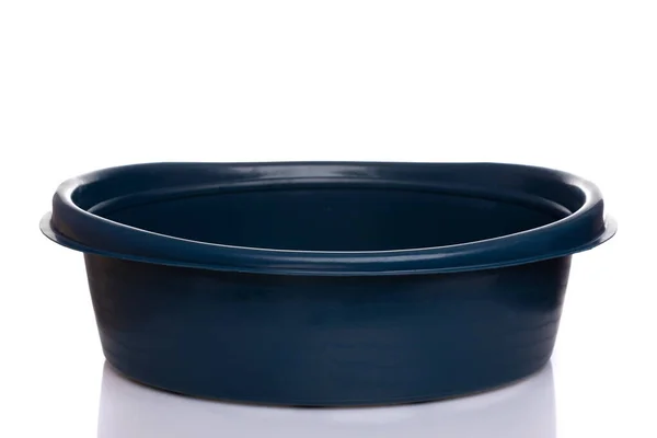 Dark blue flat plastic basin empty on white background — Stock Photo, Image