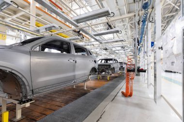 Araba üretimi için ekin. Modern otomotiv endüstrisi. Elektrikli araba fabrikası, taşıyıcı