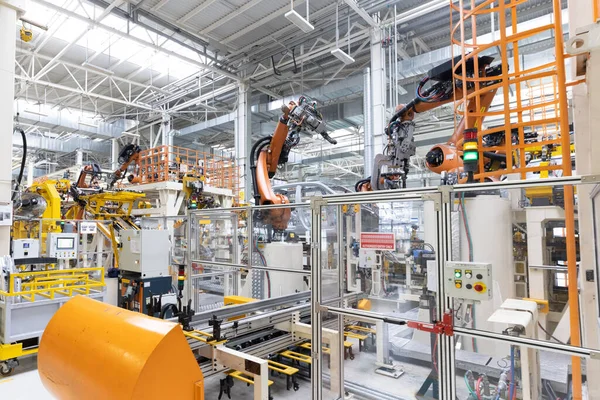 Photo of automobile production line. Welding car body. Modern car assembly plant. Auto industry. Interior of a high-tech factory, modern production — Stock Photo, Image