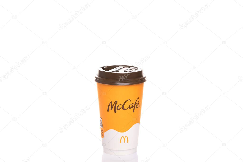 Cup of fine Americano from McDonalds with lid on white background.