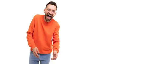 A bearded man in an orange bike laughs on a white background — Stock Photo, Image