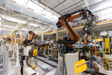 Araba üretimi için ekin. Modern otomotiv endüstrisi. Elektrikli araba fabrikası, taşıyıcı