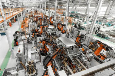 Otomobil üretim hattı. Kaynak araba gövdesi. Modern araba montaj tesisi