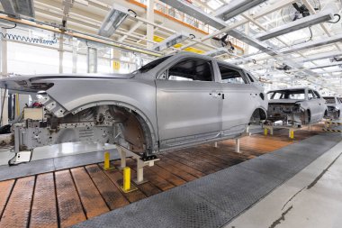 Araba üretimi için ekin. Modern otomotiv endüstrisi. Elektrikli araba fabrikası, taşıyıcı