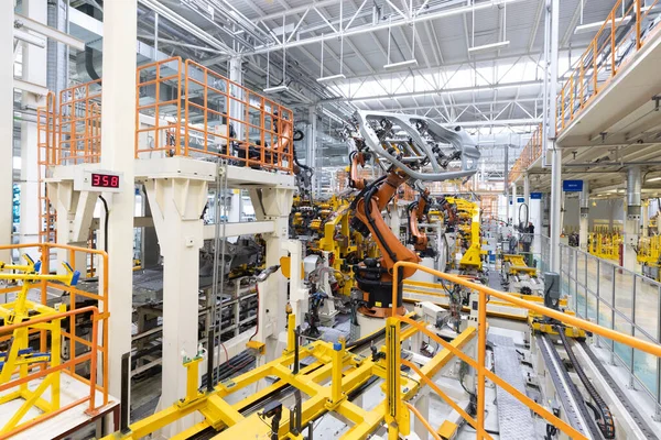 Photo of automobile production line. Welding car body. Modern car assembly plant. Auto industry — Stock Photo, Image