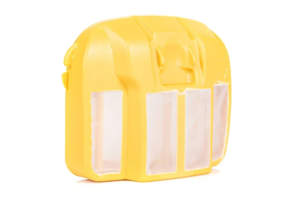 Yellow plastic air filter with white mesh for chainsaw — Stock Photo, Image