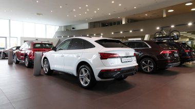 Minsk, Belarus - Jan 05, 2022: a large dealership for the sale of luxury SUV cars Audi. clipart