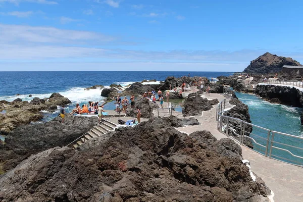 Garachico, Tenerife, Canary Islands, Spain, July 6, 2022: Volcanic rocks in the natural pools El Caleton, Garachico, Tenerife. Spain