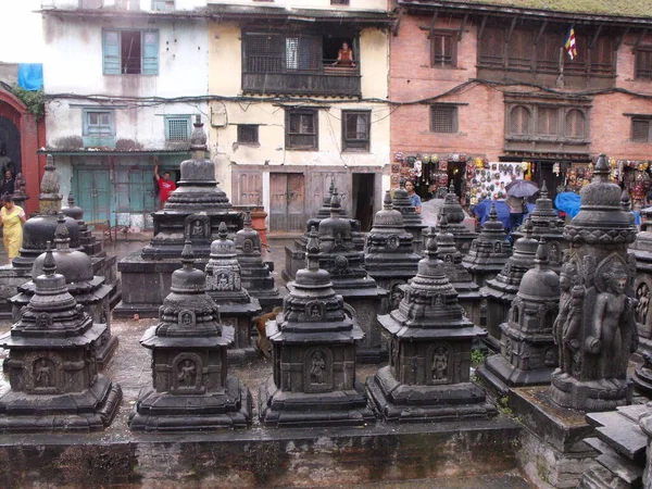 Kathmandu, Nepal, August 20, 2011: Ancient stupas at the Swayambhunath Temple, the monkey temple. Kathmandu, Nepal