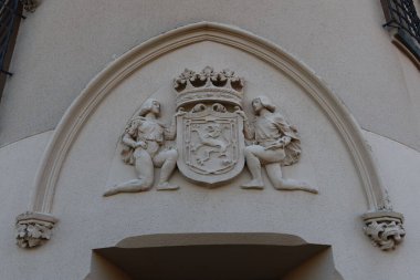 Alcorcon, Madrid, Spain, December 17, 2021: Coat of arms on the facade of one of the Valderas castles, headquarters of the MAVA Municipal Museum of Glass Art in Alcorcon, Madrid