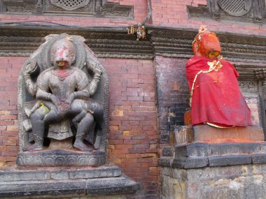 Durbar Square, Patan, Kathmandu, Nepal, August 20, 2011: Two sacred sculptures in Durbar Square, Patan, Kathmandu, Nepal
